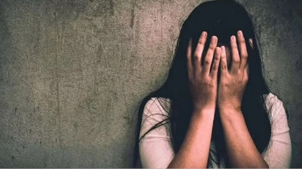 The woman, who runs a local shop, in her complaint said that the accused raped her at knifepoint, recorded a video, and threatened her to make it public.