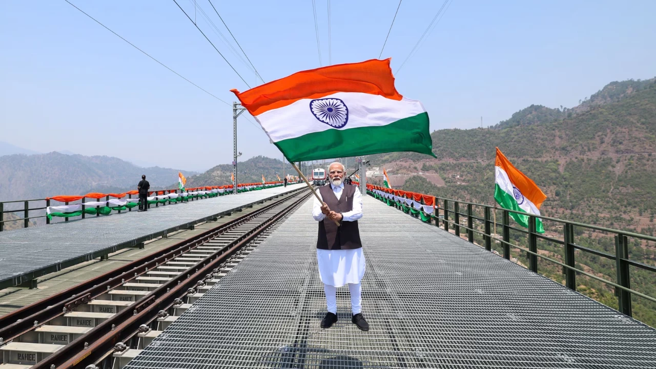 PM Modi he visited the Chenab bridge in Jammu and Kashmir where he waved the national flag. (Photo credit: narendramodi.in)