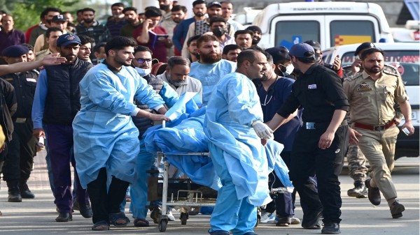 Paramedics carry an injured tourist at a hospital on April 22, 2025 in Anantnag after terrorists attacked Pahalgam. (Waseem Andrabi/HT via Getty Images)