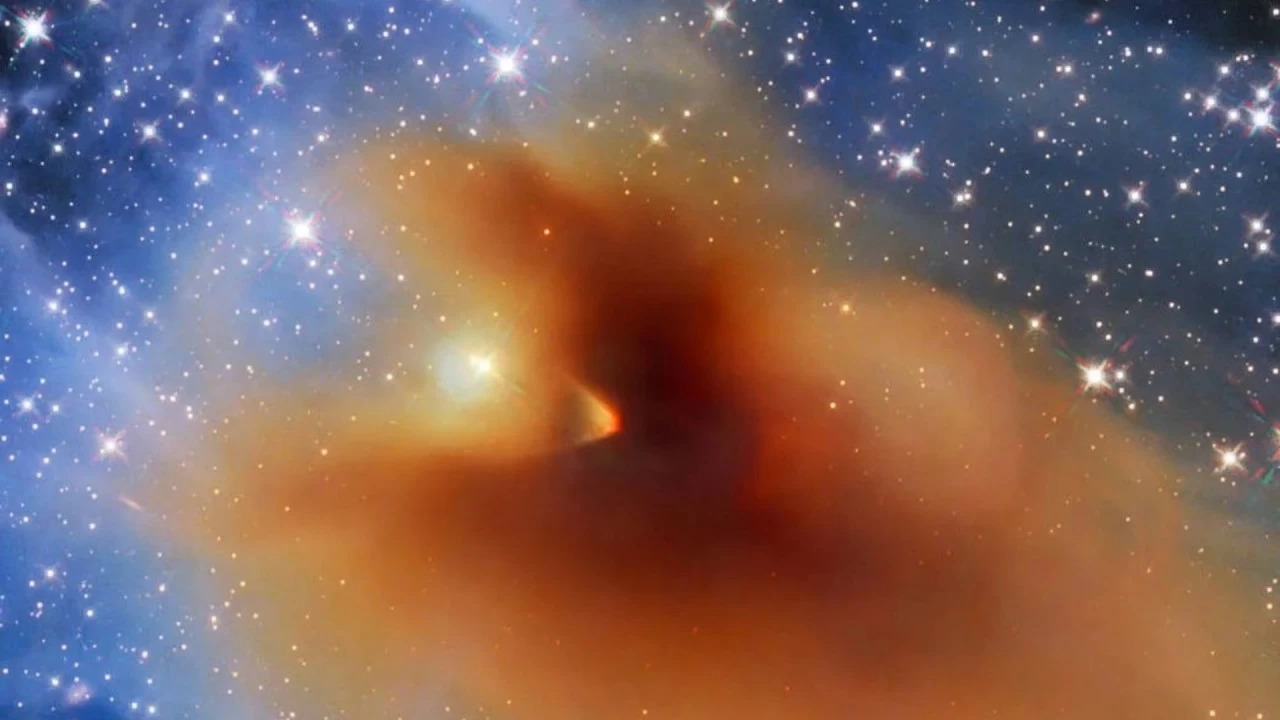 CB130-3, a dense core in the constellation of Serpens where a star is being formed. 