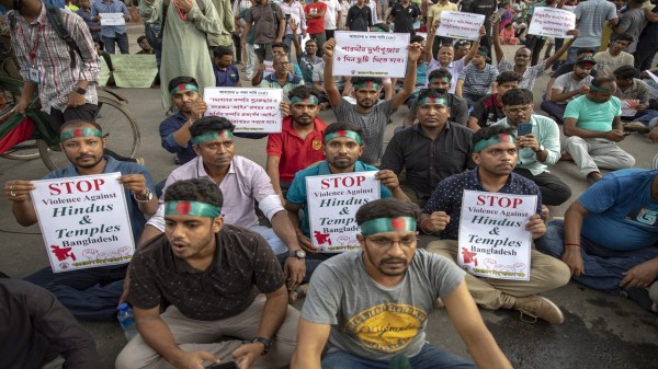 Bangladeshi Hindu protesters during the demonstration in Dhaka, Bangladesh, on August 12, 2024, against the recent religious violence against the Hindu community in Bangladesh. (Photo by Ahmed Salahuddin/NurPhoto via Getty Images)