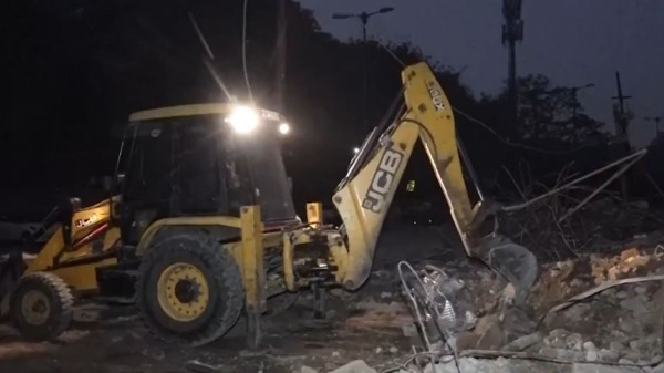 Debris being removed following an anti-encroachment drive near Turkman Gate 
