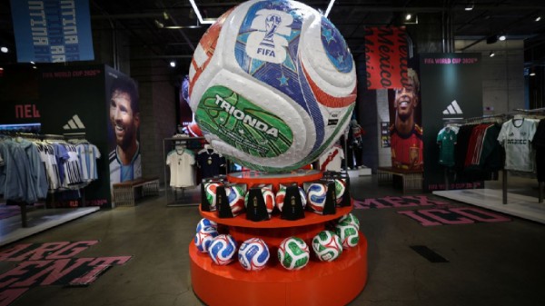 A giant model of the official Trionda match ball for 2026 FIFA World Cup is displayed inside Adidas store in Manhattan in New York City