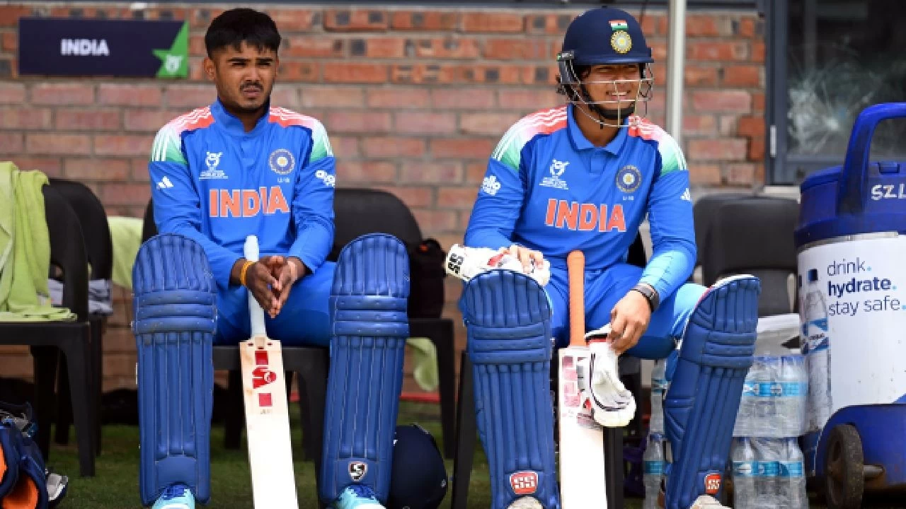 Ayush Mhatre and Vaibhav Sooryavanshi wait on the sidelines during the U-19 World Cup 2026 match between USA and India in Bulawayo, Zimbabwe.