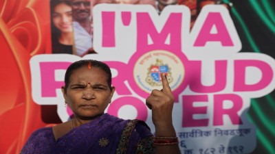 A woman after casting her vote for BMC elections that got underway at 7:30 on Thursday morning. (Photo: Reuters)