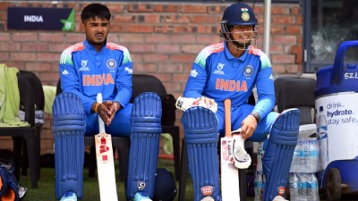 Ayush Mhatre and Vaibhav Sooryavanshi wait on the sidelines during the U-19 World Cup 2026 match between USA and India in Bulawayo, Zimbabwe.