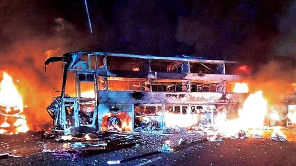 Private travels bus completely gutted in accident in Nandyal, Andhra Pradesh. 