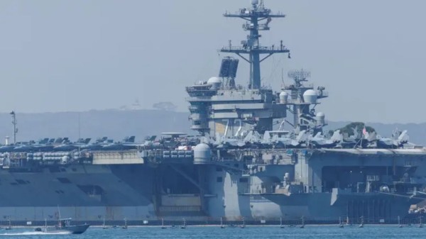 The aircraft carrier USS Abraham Lincoln, along with three destroyers armed with Tomahawk cruise missiles and US Air Force F-15E fighter jets, are being deployed to the Middle East.