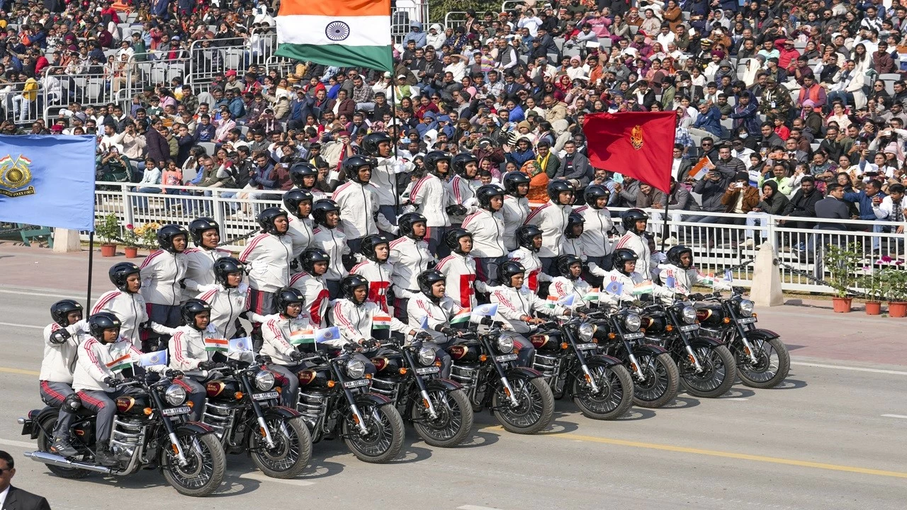 CRPF's Daredevils team performs a stunt in 'Lotus' formation during the 77th Republic Day Parade at Kartavya Path in New Delhi on Monday.