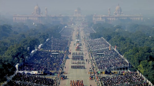 Marching contingents and tableaux proceed during the 77th Republic Day Parade at Kartavya Path in New Delhi on Monday. 