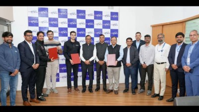 Officials from In-Space and the startups with the agreement.