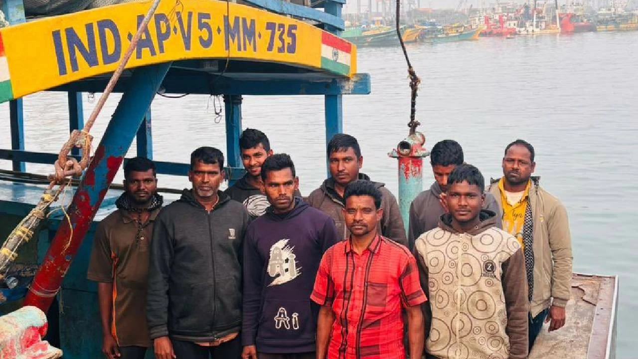 AP fishermen return after being detained by Bangladesh navy. 